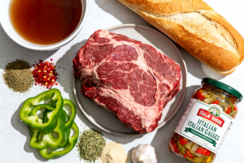 Ingredients for Portillo's Italian beef: chuck roast, broth, herbs, giardiniera and rolls
